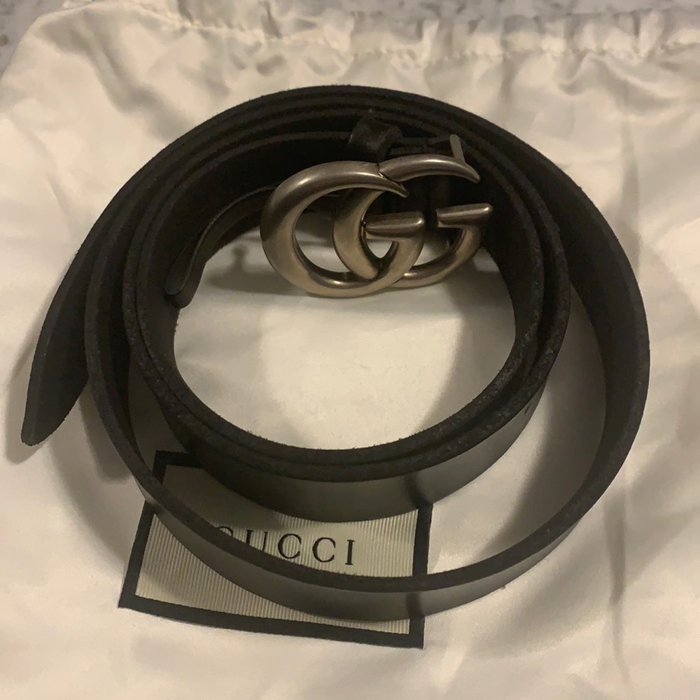 Womans gucci black belt with silver buckle
